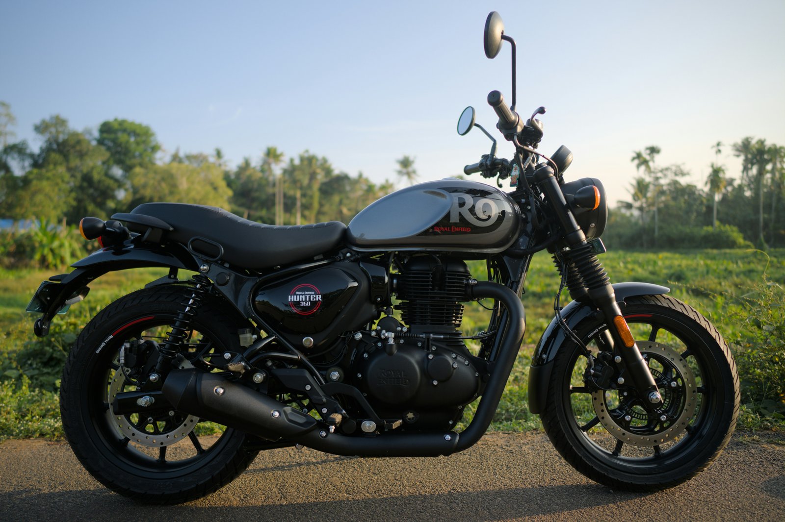 Builder and client discussing a custom motorcycle project